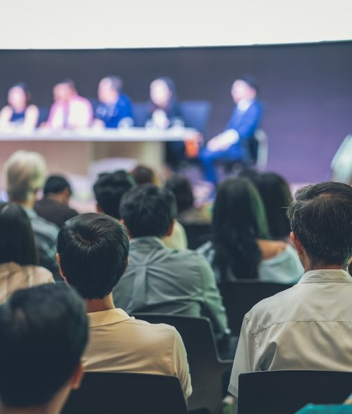 Rear view of Audience in the conference hall or seminar meeting